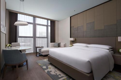 Cama o camas de una habitación en Wenzhou Marriott Hotel