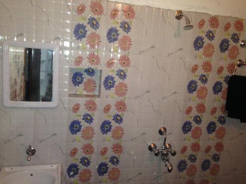 Ванна кімната в Suri Guest House