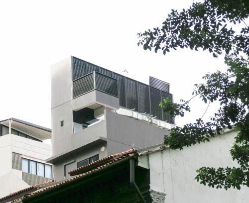 a building with a balcony on the side of it at Comfy Studio 7 by ReCharge in Singapore
