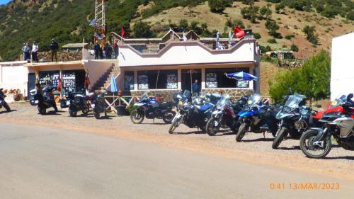 a group of motorcycles parked in front of a building at Tizintest LA HAUTE VUE 2100M - Hôtel Restaurant in Mezdiout