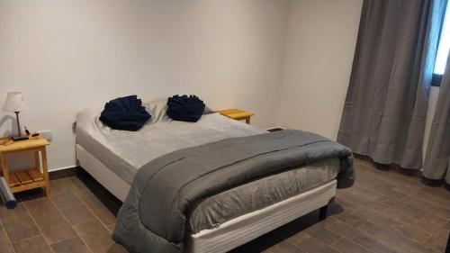 Krevet ili kreveti u jedinici u okviru objekta Dúplex 2 Luján de Cuyo