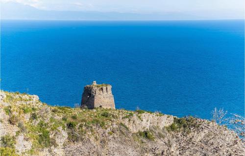 a castle on top of a cliff near the ocean at 4 Bedroom Stunning Home In Roccadaspide in Roccadaspide