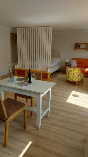 a living room with a table and a couch at Apartment Fritali in Tadten