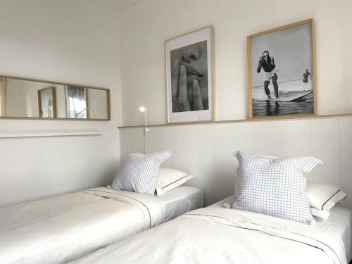 Een bed of bedden in een kamer bij Costa Beach