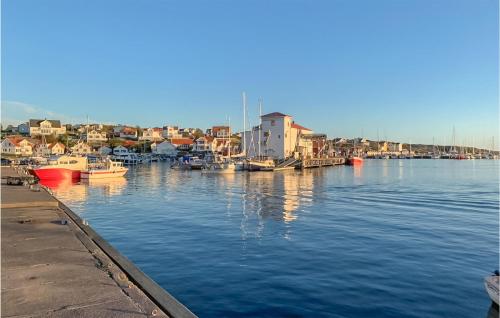 a group of boats docked in a harbor at 7 Bedroom Gorgeous Home In Bohus-Björkö in Skarvik
