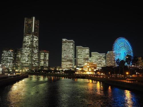 a view of a city at night with a river at Guesthouse La Cava women's single room / Vacation STAY 21865 in Yokohama