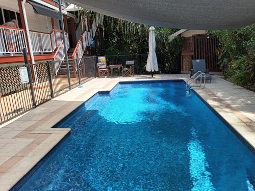 Πισίνα στο ή κοντά στο Tropical Poolside Retreat