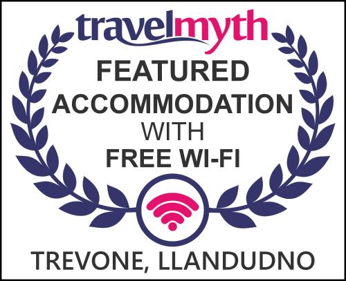 a logo for a terminated association with free wifi at THE TREVONE, Llandudno in Llandudno