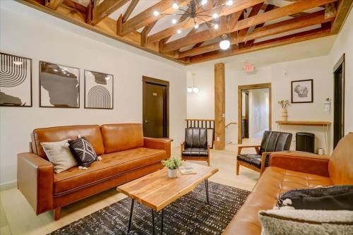 a living room with a couch and a table at 203 - Double Queen in Waunakee