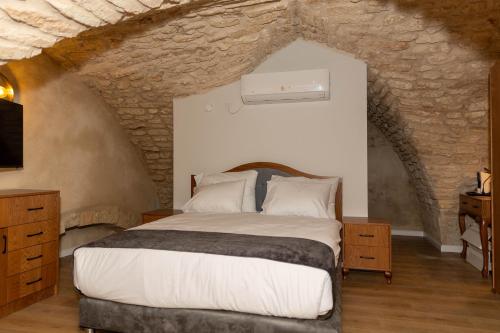Postel nebo postele na pokoji v ubytování Saint Jacob Hotel