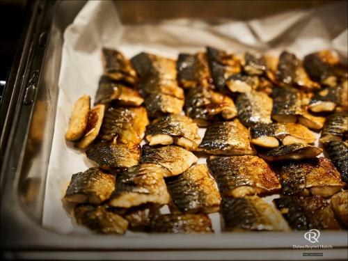 a tray filled with some food on top at Daiwa Roynet Hotel Kawasaki in Kawasaki