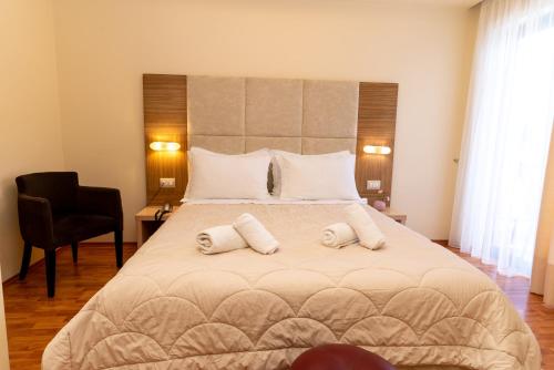 Postel nebo postele na pokoji v ubytování Hotel Brilant Saranda
