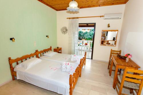 Posteľ alebo postele v izbe v ubytovaní Romantic Studios