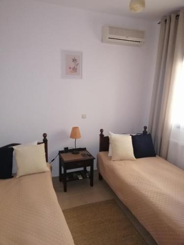 Postel nebo postele na pokoji v ubytování Villa Elan