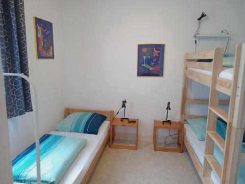 Postel nebo postele na pokoji v ubytování Hotel Kremer