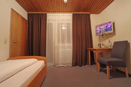 Μια τηλεόραση ή/και κέντρο ψυχαγωγίας στο Hotel Kreuz Höhengasthof