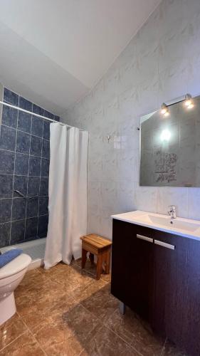 a bathroom with a sink and a toilet and a shower at Salobre Blue Sky 1 in Salobre