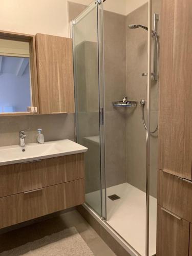 a bathroom with a shower and a sink at cairoli7novate-mansarda in Novate Milanese