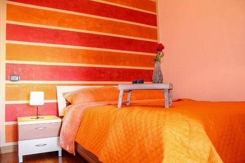 a bedroom with a flag painted on the wall at Garda residence Gardaland in Castelnuovo di Verona