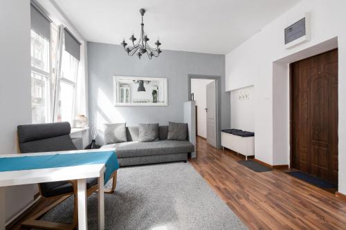 Posedenie v ubytovaní Piano Apartment w sercu Starego Miasta