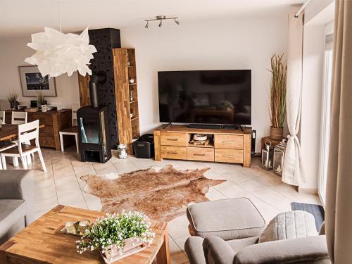 TV a/nebo společenská místnost v ubytování Unsere-Insel-Scharbeutz