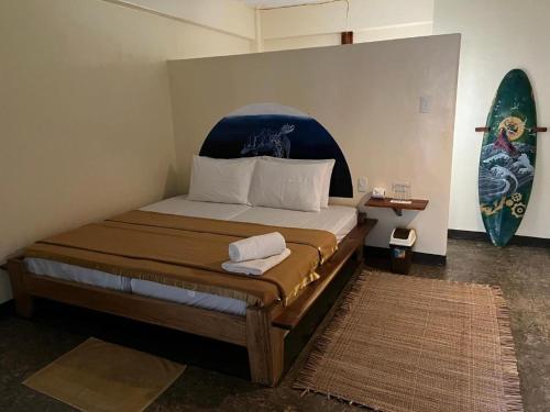 Postel nebo postele na pokoji v ubytování Lexias Hostel and Workspace - Siargao