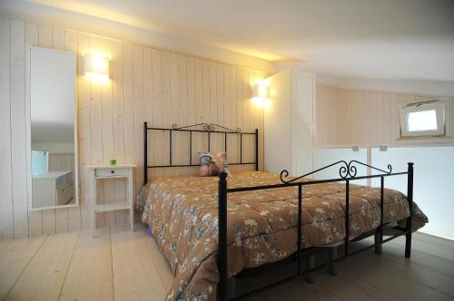 Postel nebo postele na pokoji v ubytování Casa Festa timmari