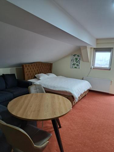 Säng eller sängar i ett rum på Casa Livia PP Aparthotel