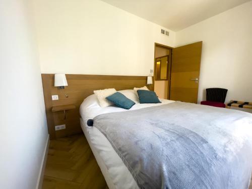 Katil atau katil-katil dalam bilik di La Maison Régent & spa - Plage de la Baule