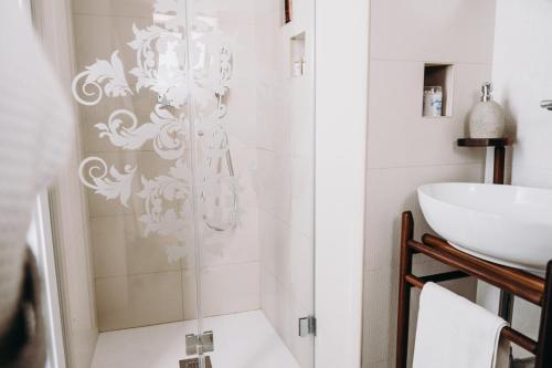 a bathroom with a shower and a sink at Mare Adesso in Polignano a Mare