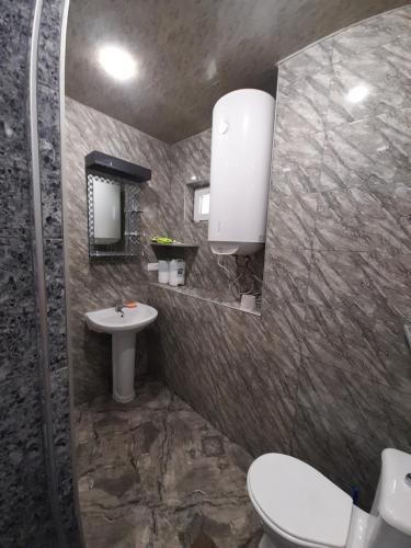 Koupelna v ubytování Guest House Gvidani