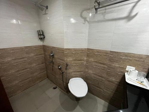 Koupelna v ubytování Ramee Guestline Hotel Bangalore