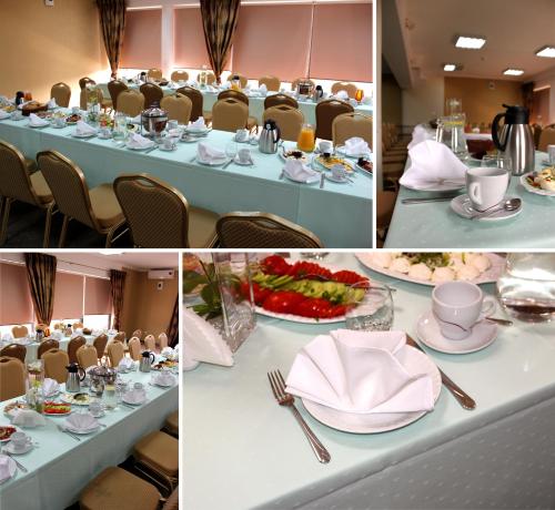 a table set up for a banquet with plates of food at Hotel Monet & Rubbens in Toruń