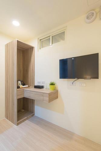 Televisyen dan/atau pusat hiburan di Hostel Jiizu
