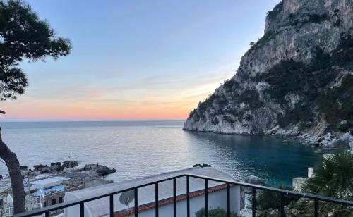 a view of the ocean from a balcony at La Cuchina in Capri