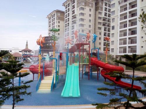 a water park with a playground with slides at Homestay Bayou Lagoon Ayer Keroh Melaka by AlliEyka in Melaka