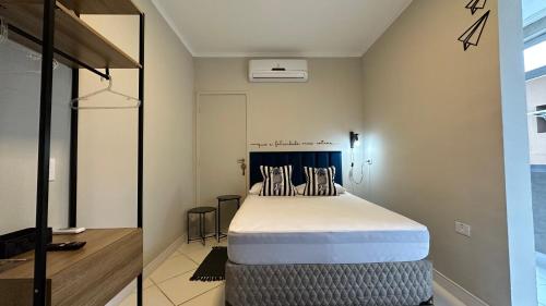 Postel nebo postele na pokoji v ubytování Studio com ar e garagem - Praia das Pitangueiras