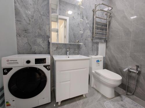 Vonios kambarys apgyvendinimo įstaigoje BAURUM Family Apartments