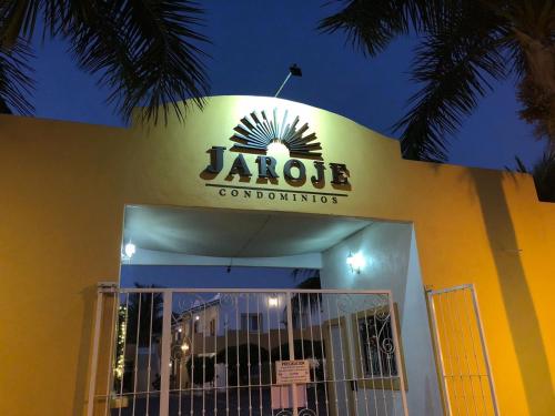 a sign on the side of a jacote restaurant at Condominios JAROJE in Santa Cruz Huatulco