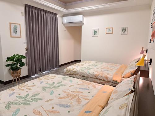 Postel nebo postele na pokoji v ubytování 澎湖民宿 7 Hostel