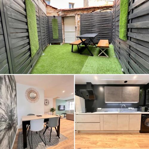 a kitchen and dining area with a table and green grass at LA PALMERAIE -wifi fibre- centre ville -PROPERTY RENTAL NM in Fontenay-le-Comte