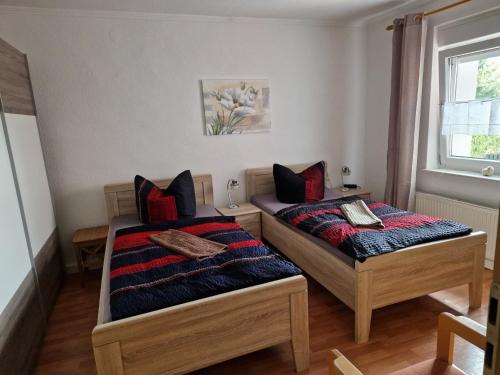 Postel nebo postele na pokoji v ubytování Ferienhaus Schneider