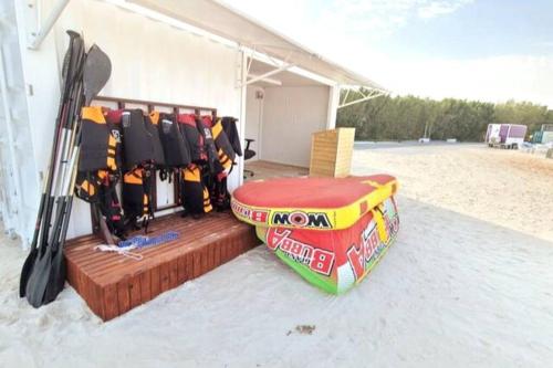 a group of skis are lined up next to a tent at Luxury apartment in Yas Island in Abu Dhabi