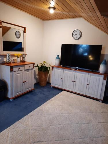 TV o dispositivi per l'intrattenimento presso Privatzimmer in Augsburg-Haunstetten