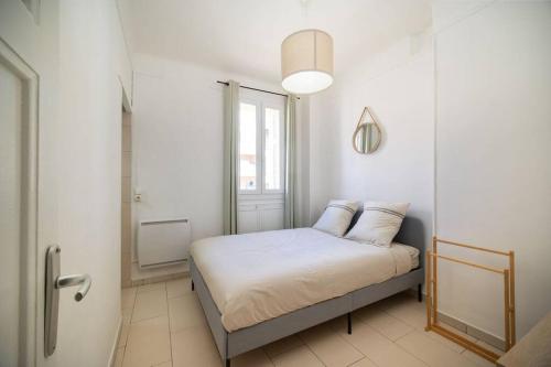 Posteľ alebo postele v izbe v ubytovaní Appartement tout équipé balcon 4 pers St Charles