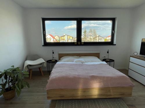 Ein Bett oder Betten in einem Zimmer der Unterkunft Apartmány 400