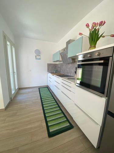Una cocina o zona de cocina en Casa Vacanza Emalí