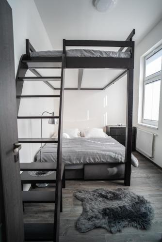 Apartmánový dům Sklípekにあるベッド