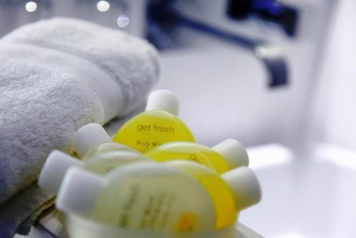 a close up of a group of bottles of soap at Fresh Boutique Hotel in Mýkonos City