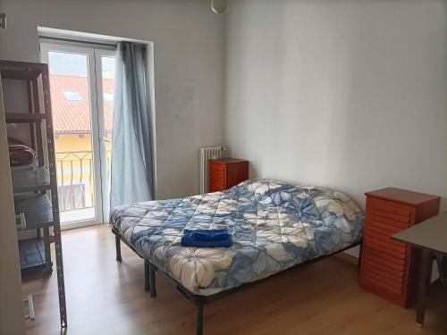 Postel nebo postele na pokoji v ubytování Appartamento in bassa montagna a Bussoleno